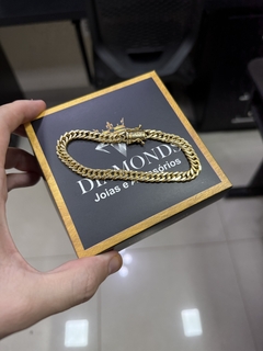 Pulseira grumet 7 mm ( fecho gaveta e marcação de ouro 750) na internet