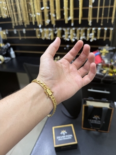 Pulseira grumet 7 mm ( fecho gaveta e marcação de ouro 750) - comprar online