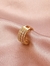 Piercing de Pressão com Pedras Brancas na internet