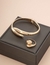 Conjunto de Pulseira e Anel Dourado - comprar online