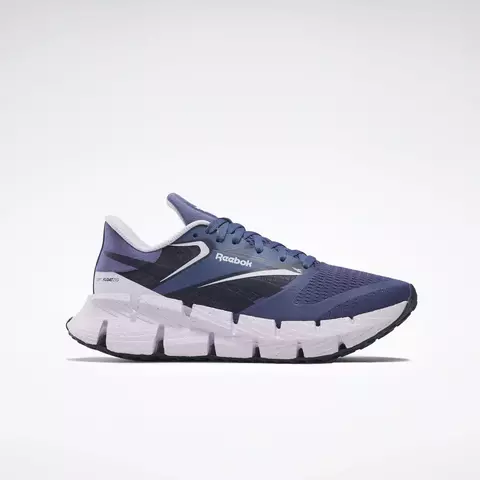 Zapatilla deportiva Reebok Floatzig 1 para mujer en color azul con suela blanca y detalles en negro