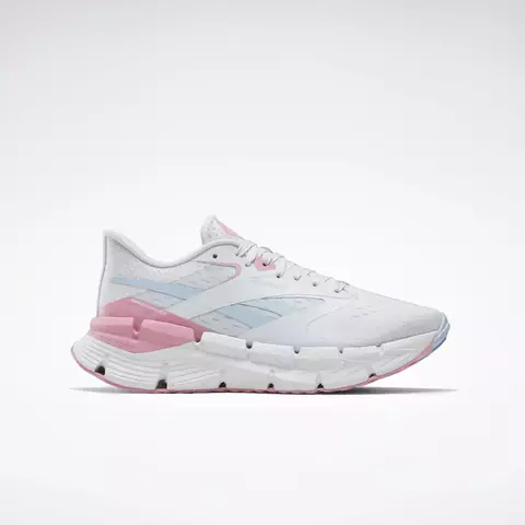 Zapatilla deportiva Reebok Floatzig Symmetros para mujer en colores blanco, rosa y celeste vista de perfil
