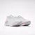 Zapatillas Reebok Floatzig Symmetros para mujer en colores blanco, rosa y celeste con diseño moderno y suela acolchonada.