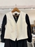 CHALECO CUERO ECO BCO/ NRO - tienda online