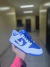 Dunk Low Azul Simbolo Branco