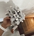 Scrunchie buzios gris en internet