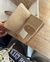 Billetera Cupido beige en internet