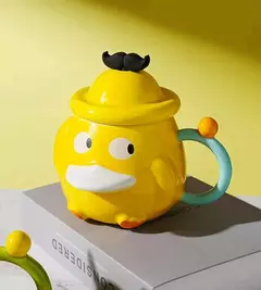 Art.11162 Taza cerámica pato amarillo con tapa en internet