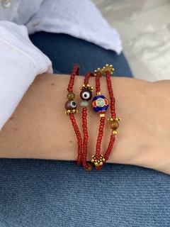 Pulsera amuleto triple