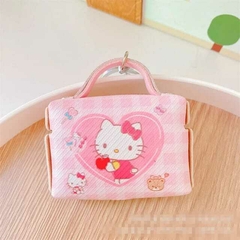 Funda auriculares mini maletin SANRIO llavero en internet