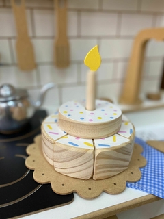 Torta y vela de madera en internet