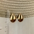 Brinco Gota Banho Dourado Tamanho M - HBBE02020 na internet