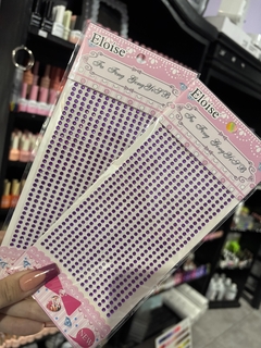 Strass con pegamento