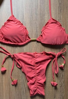 Biquíni Feminino Cortininha Liso com Calcinha Empina Bumbum e Amarra Lateral na internet