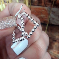 Argollas bolitas en rectangulo