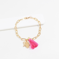 Pulsera dorada borla con dijes