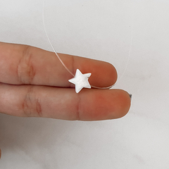 Colar fio de nylon estrela em madrepérola .