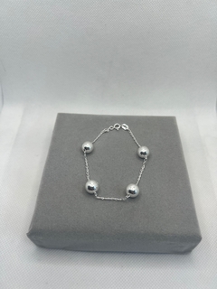 Pulseira bolas GG.