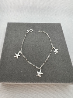 Pulseira estrelas-do-mar. - comprar online