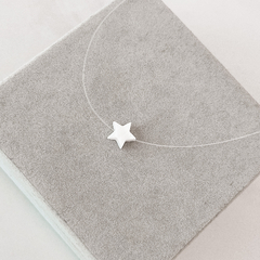 Colar fio de nylon estrela em madrepérola . - comprar online
