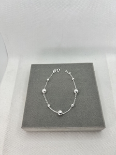 Pulseira bolas com bolinhas .