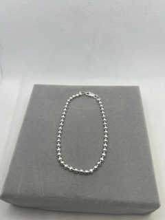 Pulseira bolinhas facetadas .