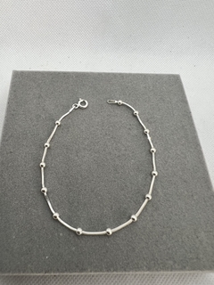 Pulseira veneziana com bolinhas.