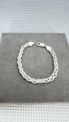 Pulseira de bolinhas trançada . na internet