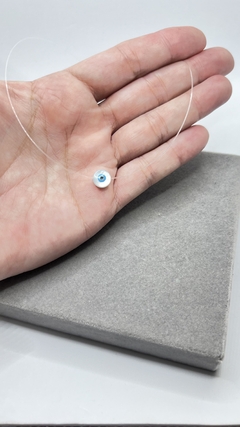 Colar fio de nylon olho grego. na internet