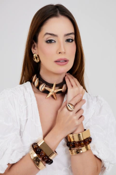 CHOKER SANTORINI DE BÚZIOS NATURAIS DOURADA na internet