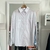 Camisa larga con bolsillos