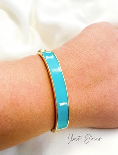 Bracelete esmaltado em azul e dourado