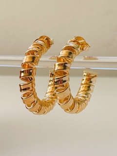 Brinco argola espiral na internet
