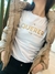 Remera MANGAS LARGAS - QUERER ES CUIDAR
