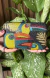 Bolsa clutch tucano brilhosa na internet