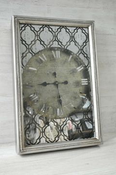 Reloj de pared espejado