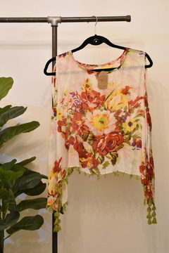Blusa con estampado floral y borlas en borde
