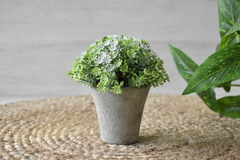 Maceta con planta artificial