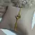 Pulseira trevo banhado a ouro 18k