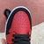 Tênis Air Jordan 1 Mid Reverse Bred na internet