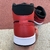 Tênis Air Jordan 1 Mid Reverse Bred na internet