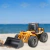 Excavadora con pala frontal a control remoto HUINA TOYS 1520 escala 1:18