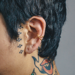 Ear cuff X (baño de oro) en internet