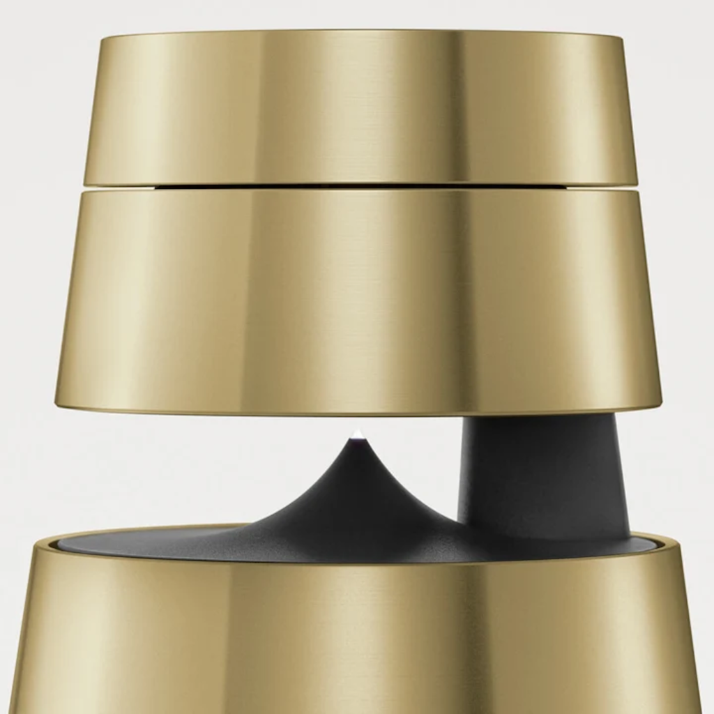 Image of Bang & Olufsen Beosound 1 l Brass Tone l Portable Wireless Wi-Fi & Bluetooth Speaker l Auto Falante Sem Fio Portátil 360º l Bateria de até 12 horas l Acoustic Lens Technology l WiFi & Bluetooth l Chromecast & Google Assistant Integrados l Compatível com Apple 2 & Spotify Connect l Recomendado para áreas de 10m² até 50m²