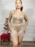 Conjunto cropped e shorts de paetê na internet