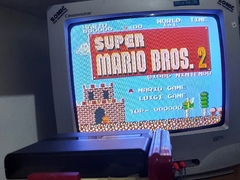 Nintendo Disk System com Super Mario Bros e Bomberman