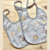 BABEROS DE TELA Y PLASTICO GRANDE PARA ATAR SURTIDOS x12 - A Mimir Babyshop