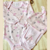 CONJUNTO BODY + GORRO + RANITA ROSA