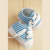 ZAPATILLAS RAYAS CELESTE