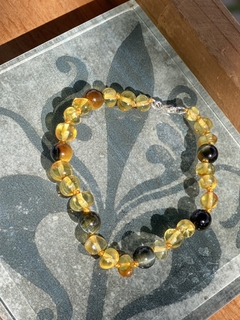Pulseira Âmbar e Olho de águia na internet